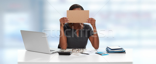 Business woman with cardboard on face Stock photo © Kurhan