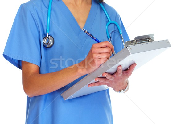 Hands of doctor woman writing prescription Stock photo © Kurhan