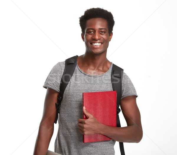 Afro-amerikaanse student jonge glimlachend geïsoleerd witte Stockfoto © Kurhan