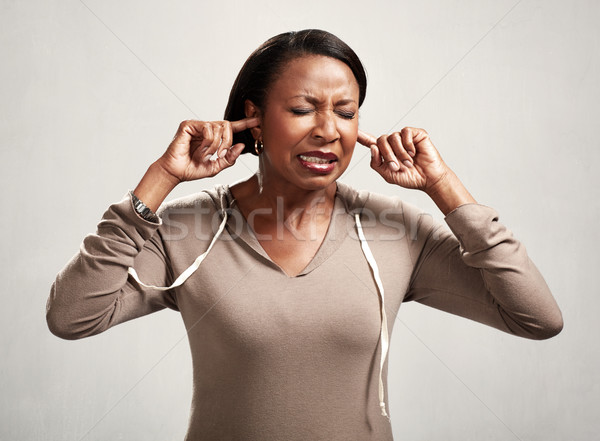 Black woman hearing anything Stock photo © Kurhan