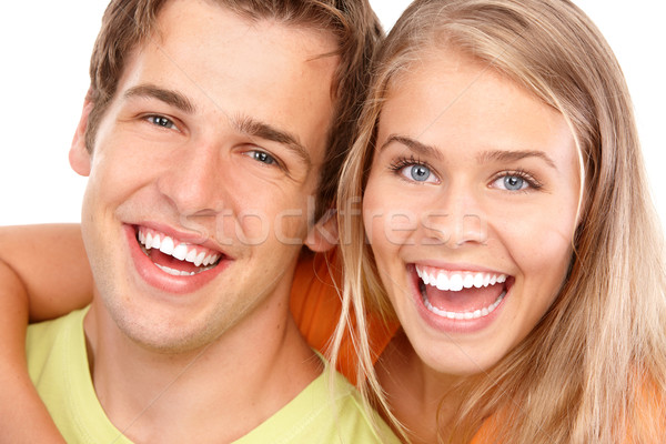 Fiatal pér szeretet boldog mosolyog pár fehér Stock fotó © Kurhan