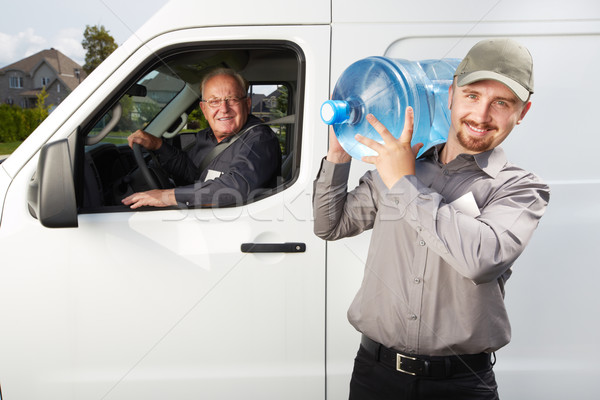 Water levering dienst man fles groot Stockfoto © Kurhan