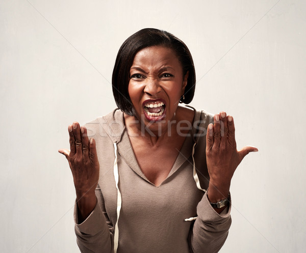 Angry african american woman Stock photo © Kurhan