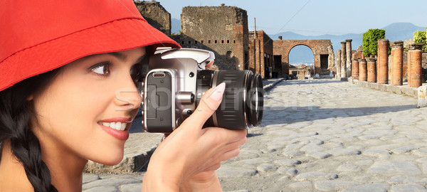 Tourist woman with a camera. Stock photo © Kurhan