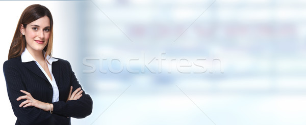 Mulher de negócios jovem atraente sorridente azul negócio Foto stock © Kurhan