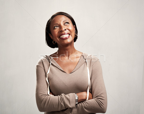 Denken glimlachend afrikaanse vrouw afro-amerikaanse oplossing Stockfoto © Kurhan