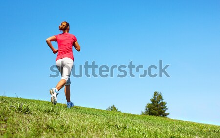 Jogging woman. Stock photo © Kurhan