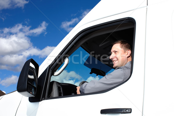 Przystojny ciężarówka kierowcy uśmiechnięty samochodu stanie Zdjęcia stock © Kurhan