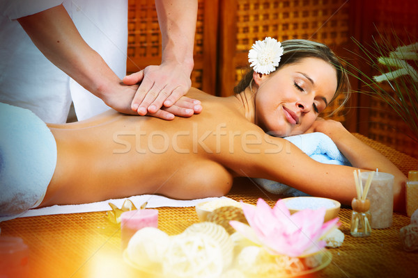Beautiful woman having massage. Stock photo © Kurhan