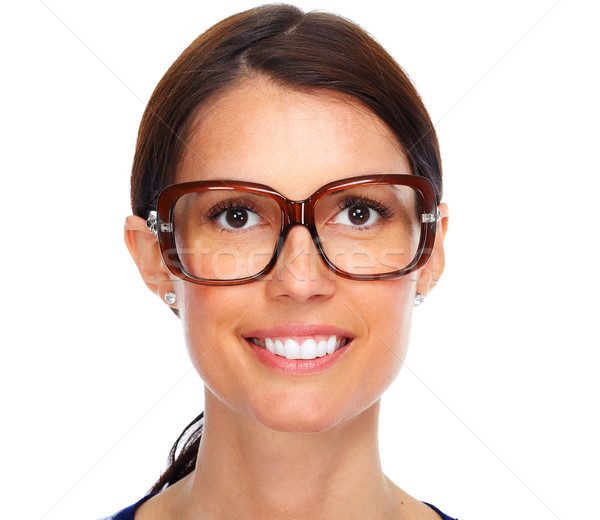 Beautiful young lady wearing eyeglasses. Stock photo © Kurhan