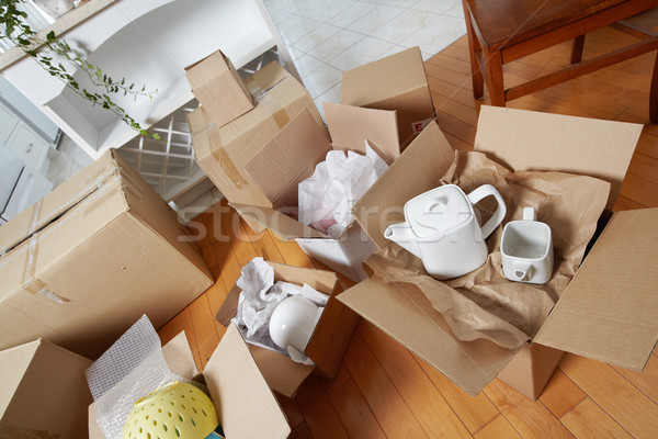 Moving boxes in new house. Stock photo © Kurhan