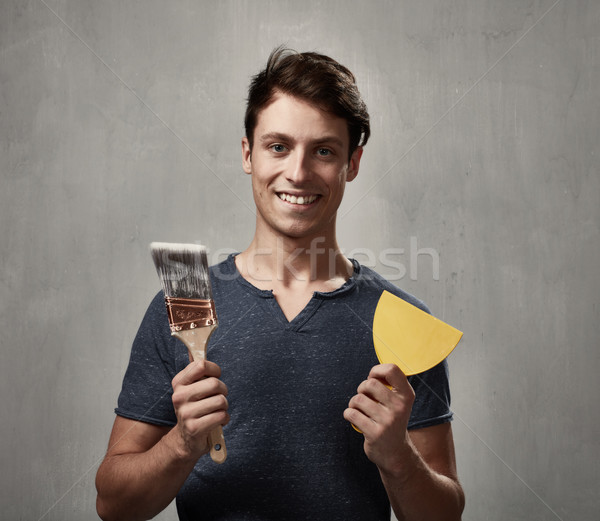 Homme forage travailleur de la construction bricoleur maison [[stock_photo]] © Kurhan