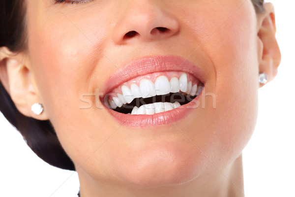 Güzel bir kadın gülümseme beyaz diş diş sağlık kız Stok fotoğraf © Kurhan