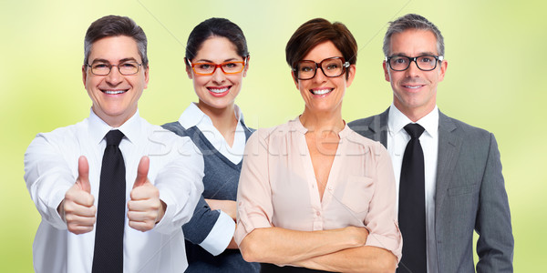Group of business people wearing eyeglasses. Stock photo © Kurhan