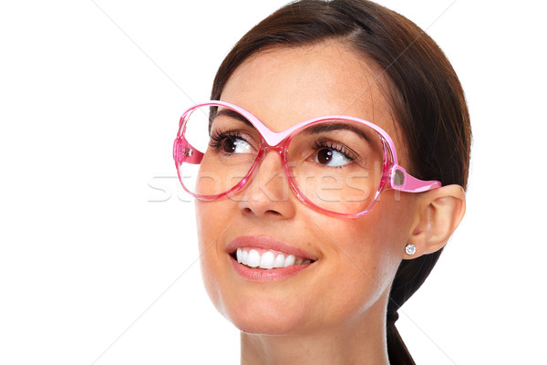 Beautiful young lady wearing eyeglasses. Stock photo © Kurhan