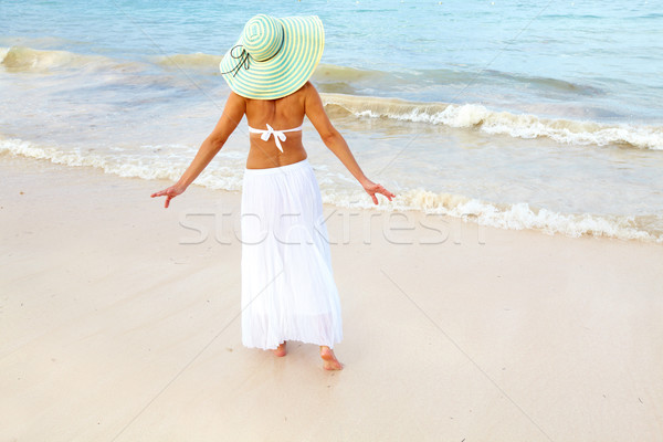 Happy woman on Punta Cana beach. Stock photo © Kurhan