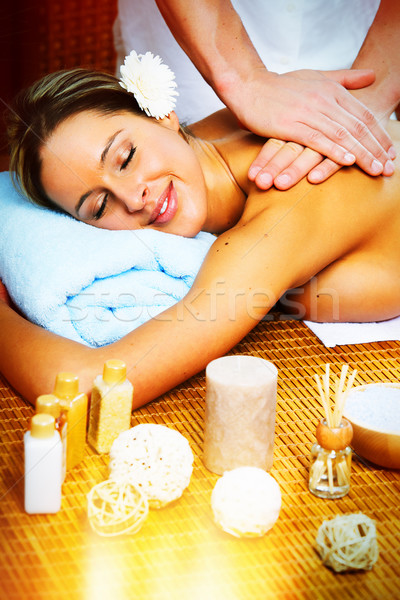 Beautiful woman having massage. Stock photo © Kurhan