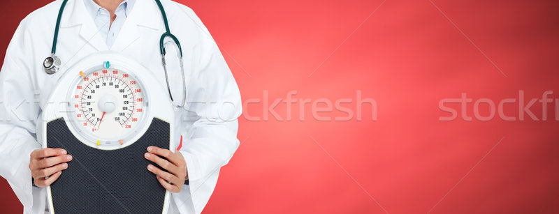 Doctor woman with scales. Stock photo © Kurhan