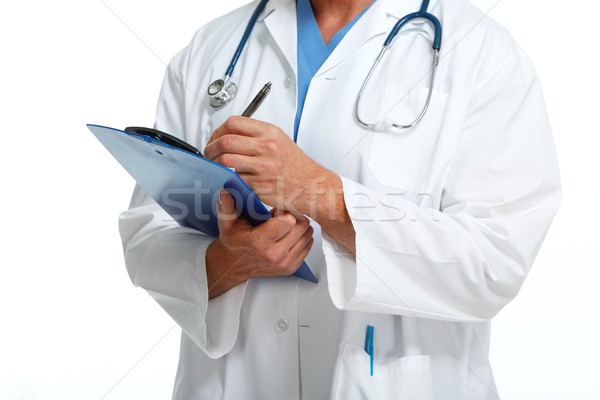 Doctor hands with clipboard Stock photo © Kurhan