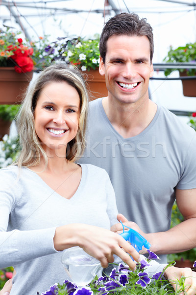 [[stock_photo]]: Jardinage · jeunes · souriant · personnes · travail · effet · de · serre