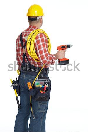 Villanyszerelő férfi fúró drót kábel izolált Stock fotó © Kurhan