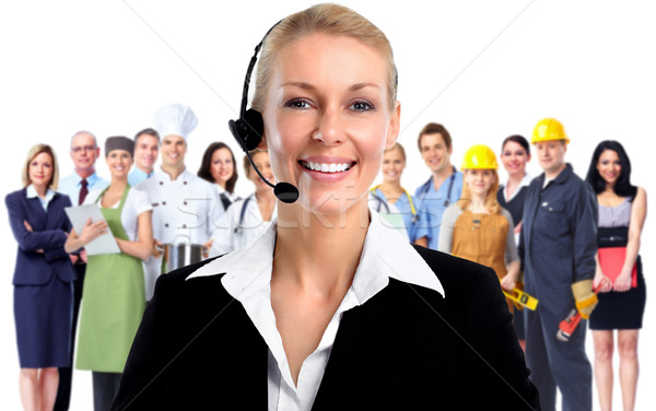 Smiling agent woman with headsets. Stock photo © Kurhan