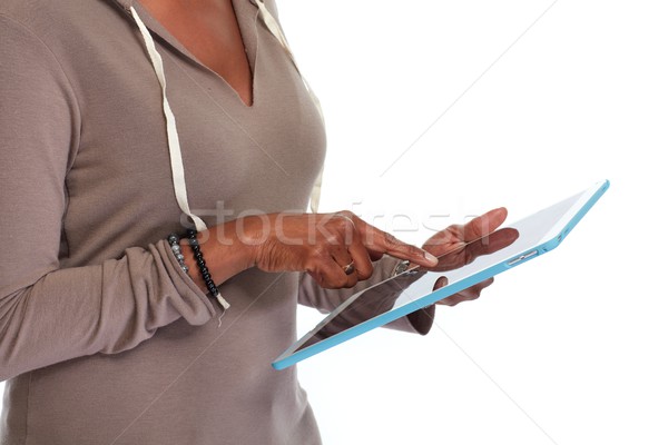 Stock photo: Hands with tablet computer.