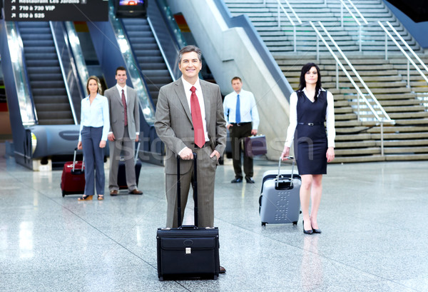 Stock photo: Group of business people in airport.