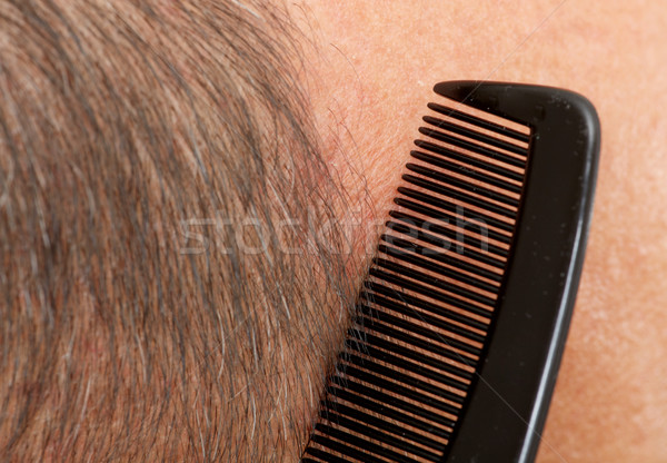 Man head with a comb. Stock photo © Kurhan