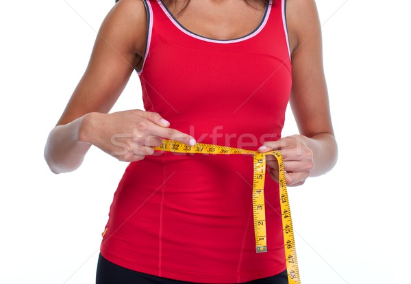 Abdomen with measuring tape. Stock photo © Kurhan