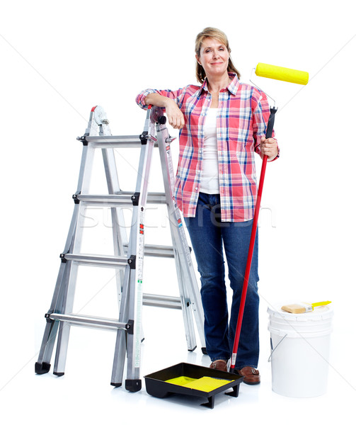 Senior woman doing renowation at home. Painter. Stock photo © Kurhan