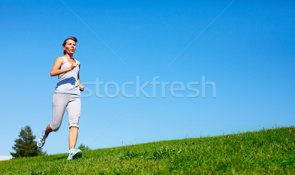 Jogging woman. Stock photo © Kurhan