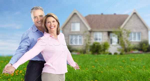 Couple de personnes âgées nouvelle maison immobilier ciel famille maison [[stock_photo]] © Kurhan