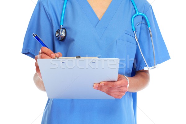 Hands of doctor woman writing prescription Stock photo © Kurhan