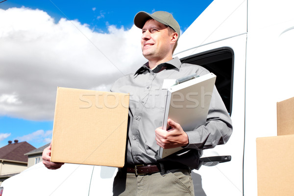Delivery postal service man. Stock photo © Kurhan