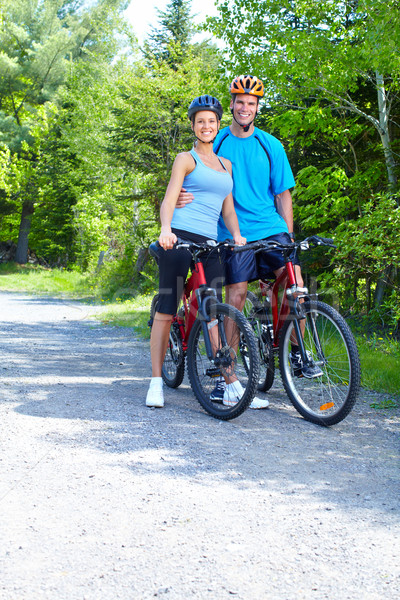 Foto stock: Equitación · Pareja · feliz · sonriendo · parque · mujer