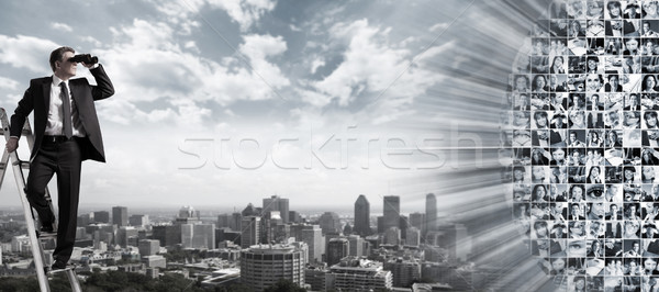 Zakenman verrekijker spionage concurrenten kantoor man Stockfoto © Kurhan
