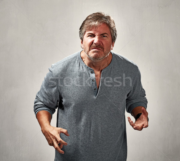 Agresszív férfi őrült portré szürke sötét Stock fotó © Kurhan