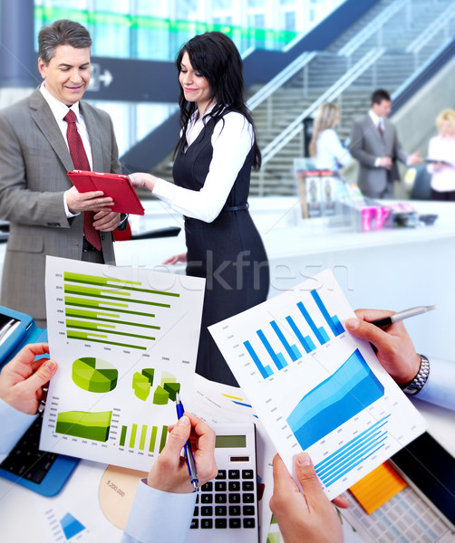 Stock foto: Geschäftsleute · arbeiten · Graphen · finanziellen · Business · Sitzung