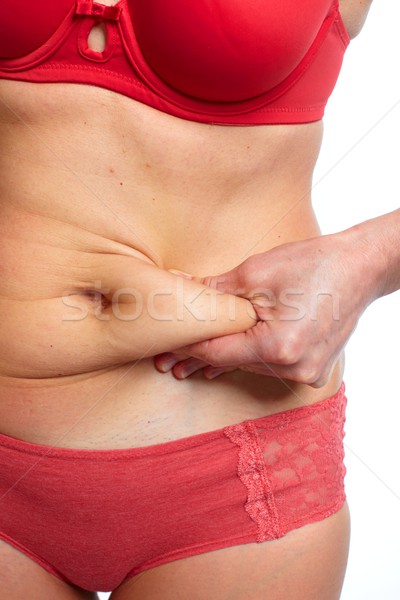 Stock photo: Fat stomach.