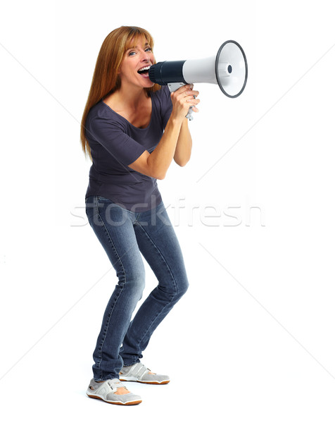 Happy woman talking in megaphone. Stock photo © Kurhan