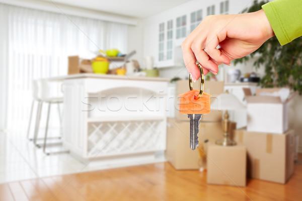 Hand with house key. Stock photo © Kurhan
