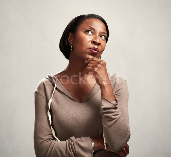 Thinking african woman Stock photo © Kurhan