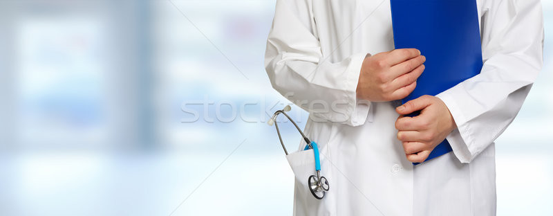 Doctor hands with stethoscope and clipboard Stock photo © Kurhan