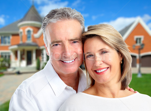 Senior Couple near new house. Stock photo © Kurhan