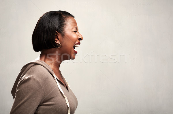 Angry screaming african american woman Stock photo © Kurhan