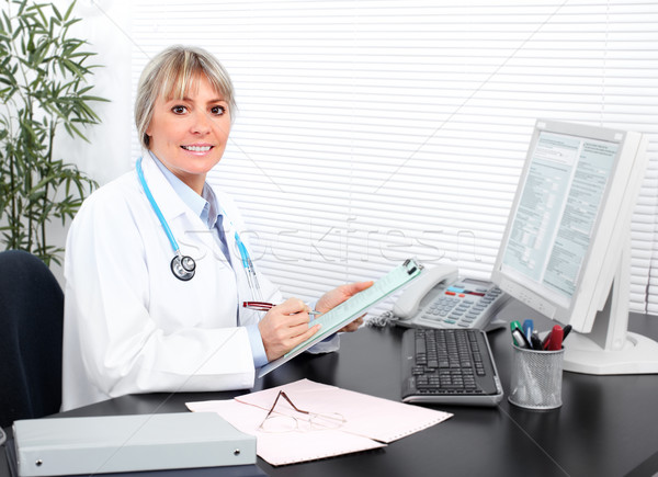 Mature medical doctor woman. Stock photo © Kurhan