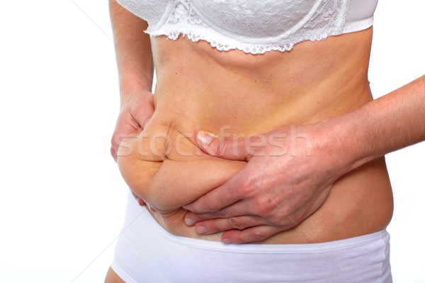 Kobieta tłuszczu brzuch nadwaga ciało Zdjęcia stock © Kurhan