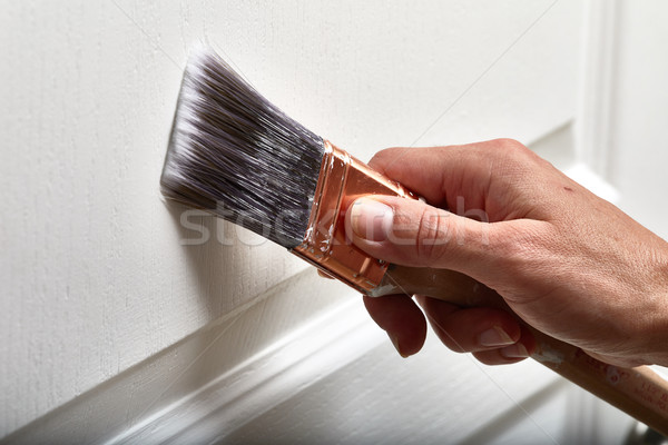 Hand with a paint brush. Stock photo © Kurhan