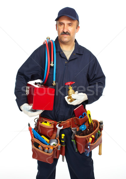 Plumber with a tool belt. Stock photo © Kurhan